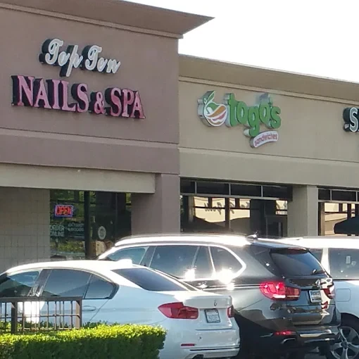 TOP TEN Nails & Spa storefront and salon sign